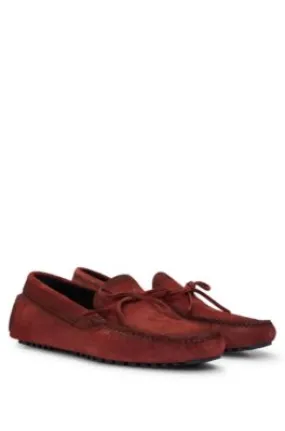 Suede moccasins with buckled upper strap